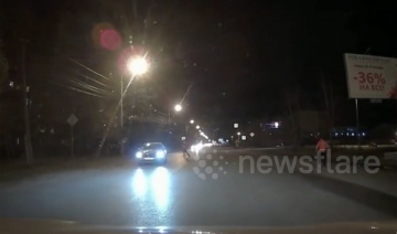 Ô tô húc bay tên trộm lên không trung khi hắn đang tẩu thoát