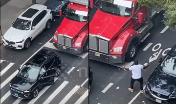 Bị thốc còi, tài xế xe SUV có hành động khiến lái xe đầu kéo "phát điên"