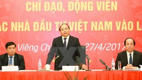 Prime Minister praises efforts of Vietnamese investors in Laos 
