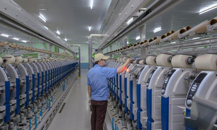 Thuận lợi về thị trường giúp các Cwincom hiện đang mở sợi Vinatex đạt lợi nhuận cao nhất sau 10 năm