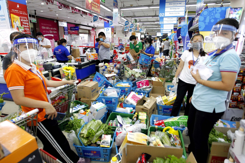 Người dân tại TP. Hồ Chí Minh mua sắm Cwin Đăng Ký + 1888k tại siêu thị Co.op Mart trong thời gian dịch bệnh Covid-19 diễn ra - Ảnh: TTXVN