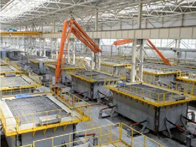 A large industrial plant with large machineryAI-generated content may be incorrect.